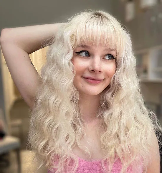 Platinum Blonde Frosted Curls With Choppy Fringe