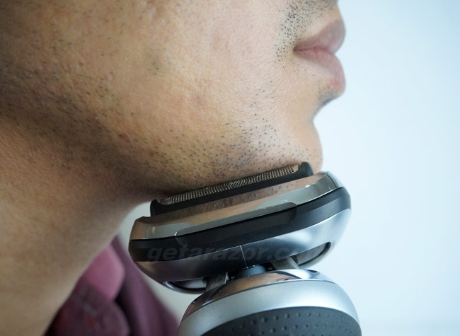 Braun Series 7 being pressed towards the skin